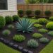 Colorful, low-maintenance backyard garden with mulch, drought-tolerant plants, and stepping stones